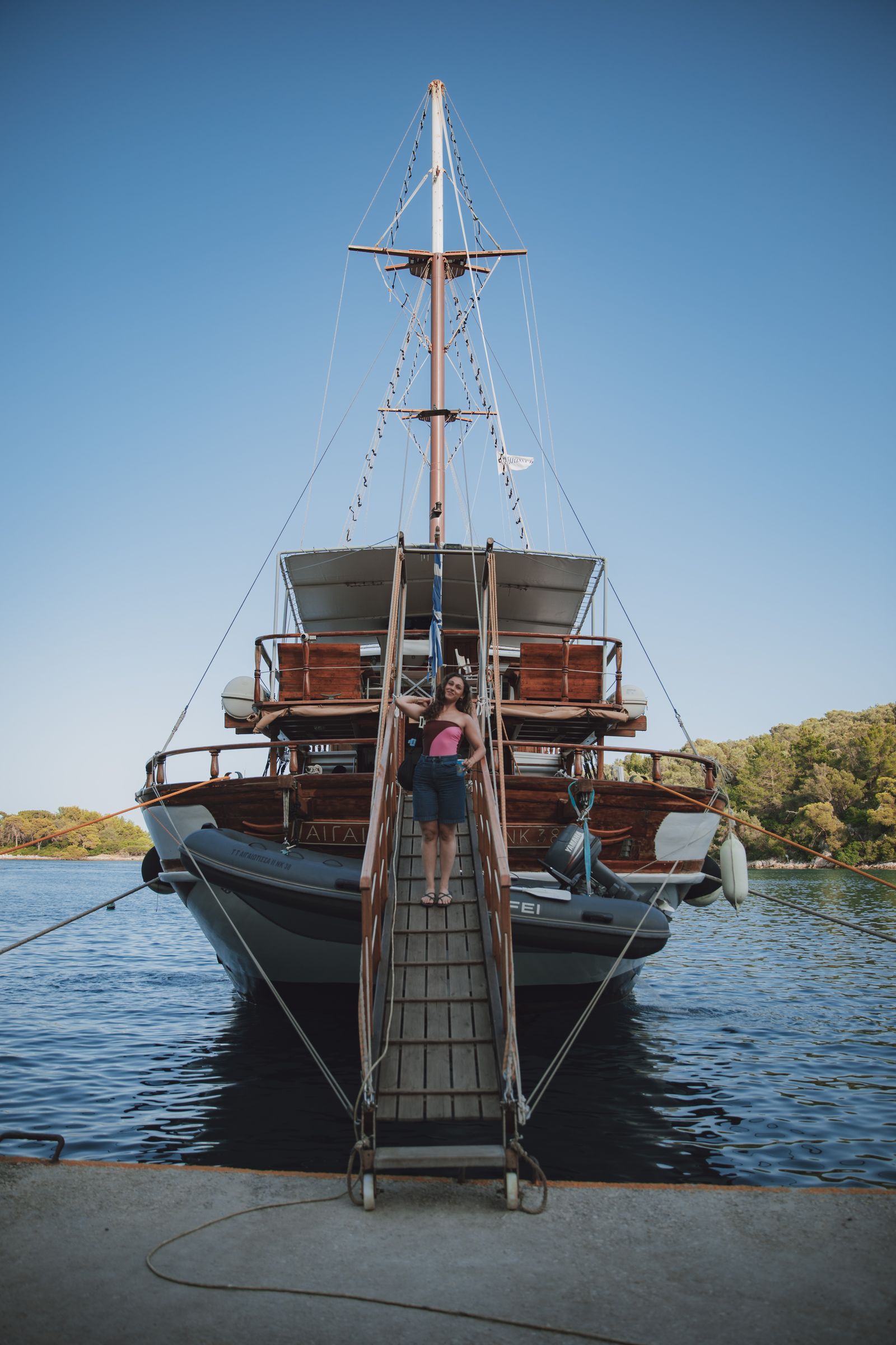 Boarding the gulet in Gaios harbour, framed dead centre by the bow.